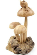 Wooden Frog On Top Of Mushroom